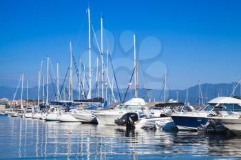 Sailing yachts and motor boats moored in marina of Ajaccio, the capital of Corsica, French island in the Mediterranean Sea