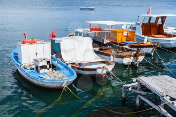 Colorful wooden fishing and pleasure boats moored in small port of Avcilar, district of Istanbul, Turkey