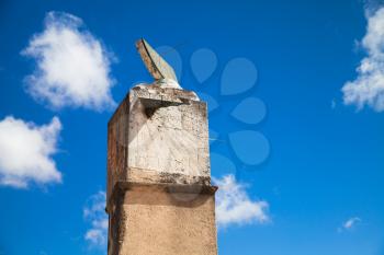 Old sundial under blue sky, landmarks of Santo Domingo, Dominican Republic