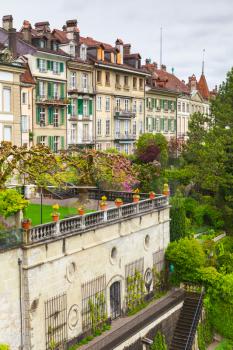 Bern old town, Switzerland. Vertical landscape with old living houses and gardens