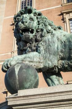 Statue of the lion at Royal Palace. Old Town of Stockholm, Sweden. Close-up photo