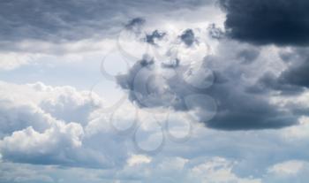 Dark sky with stormy clouds, natural background photo texture