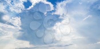 Clouds over blue sky in daytime, panoramic background photo texture