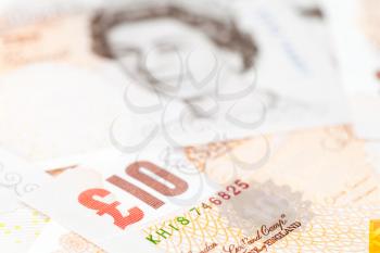 Ten pound notes, Bank of England. Close-up photo with selective focus