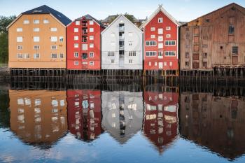 Coast of river Nidelva. Colorful wooden houses in old town of Trondheim, Norway