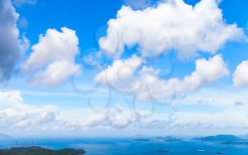 Clouds in blue sky at day over bay of Hong Kong