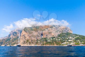 Coastal landscape with rocks of Capri island near Marina Piccola beach. Mediterranean Sea, Italy