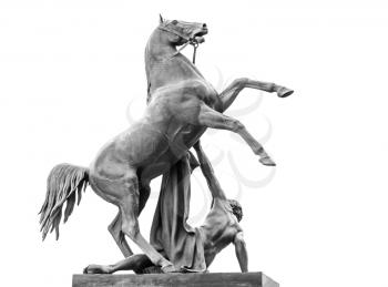 Horse Tamers sculpture isolated on white, designed by the Russian sculptor, Baron Peter Klodt von Urgensburg in 1841. Nevsky Prospect, Anichkov bridge, Saint-Petersburg, Russia