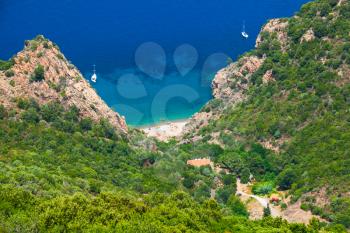 Coastal landscape of South Corsica. Small beach on Capo Rosso, Piana region