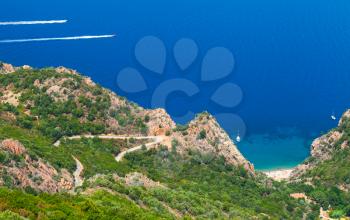 Coastal landscape of Corsica island. Small beach on Capo Rosso, Piana region