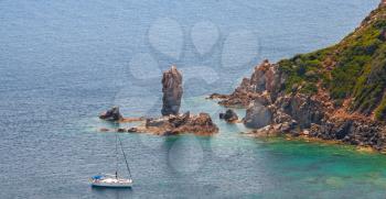Coastal rocks of Corsica island. Capo Rosso, Piana region
