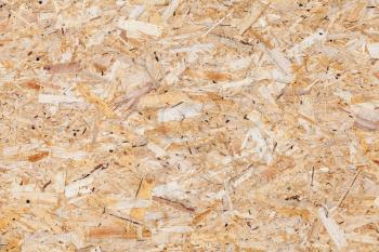 Wooden oriented strand board or OSB. Sterling board background photo texture 