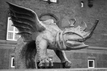 Detail from the basin edge of Dragon Fountain located in the City Hall Square in Copenhagen, Denmark. It was inaugurated in 1904. Black and white photo