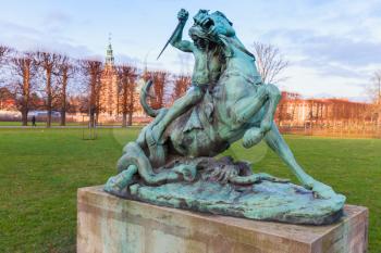 Fight with Snake sculpture in Rosenborg Castle Gardens or Kongens Have literally The Kings Garden is the oldest and most visited park in central Copenhag