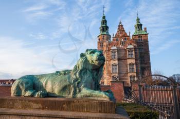 Lion statue near the entrance to Rosenborg Castle, renaissance castle located in Copenhagen, Denmark