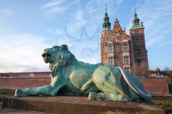 Bronze Lion statue near the entrance to Rosenborg Castle, renaissance castle located in Copenhagen, Denmark