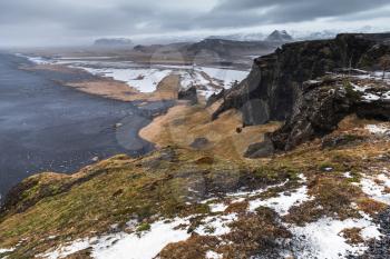 Black sand beach landscape in spring season, North Atlantic Ocean coast. Vik, Iceland