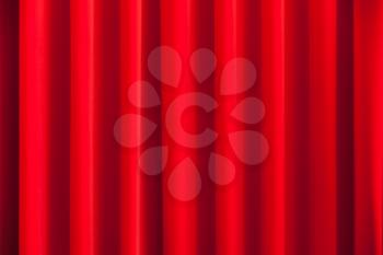 Red theatrical curtain, background photo texture