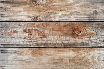 Natural old uncolored wooden wall. Frontal flat background photo texture