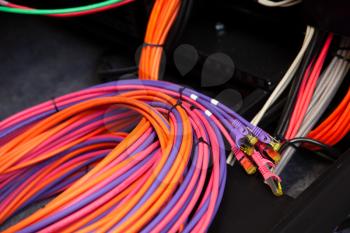Large group of colorful disconnected Internet cables, close-up photo with selective focus