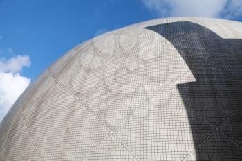 Abstract contemporary architecture, concrete sphere with tiling mosaic