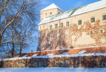 Turku Castle in winter, medieval building in the city of Turku in Finland. It was founded in the late 13th century and stands on the banks of the Aura River