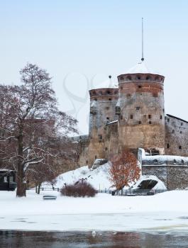 Olavinlinna in winter, 15th-century castle located in Savonlinna, Finland. The fortress was founded by Erik Axelsson Tott in 1475
