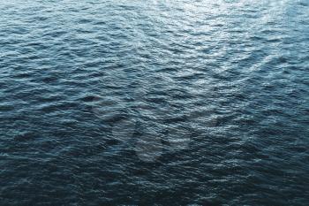 Shining surface of Ocean water, natural background photo texture