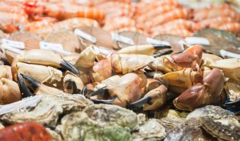 Counter with assortment of seafood market in Bergen, Norway. Close-up photo with selective focus