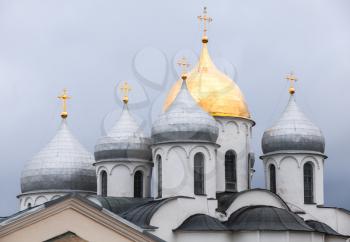 Saint Sophia Cathedral domes under cloudy sky, Veliky Novgorod, Russia. It was built in 1045-1050