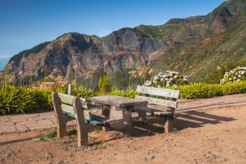 Outdoor benches and table in Mountain village Serra De Agua of Madeira island, Portugal