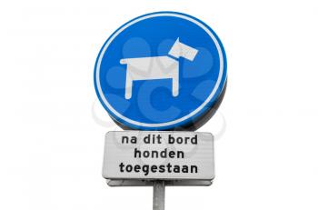Allowed dogs after this board, round blue street sign isolated on white background, Netherlands