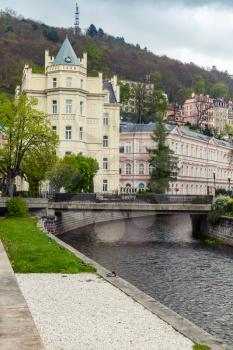 Tepla river, vertical street view of  Karlovy Vary town, Czech Republic