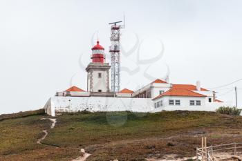 Cabo da Roca, tourist attraction and limit of continental Europe, with the lighthouse on the background