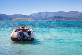 Pleasure motor boat anchored in bay of Zakynthos island, Greece