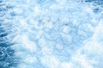 Sea water with splashes and foam, natural background photo texture
