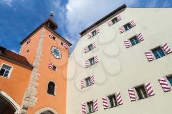 Old Clock Tower facade, Entrance to Regensburg city from Stone Bridge. Germany