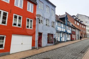 Street view with traditional colorful living houses. Flensburg city, Germany
