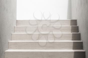 Abstract architecture background photo. White stairs, empty modern interior fragment