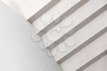 Abstract architecture background photo. White stairs, empty interior details