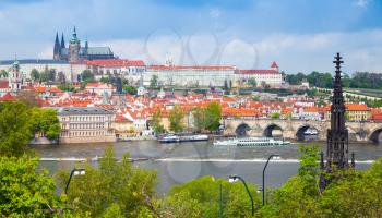 Old Prague cityscape with St. Vitus Cathedral and Charles Bridge. Czech Republic