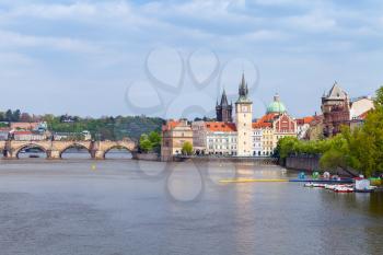 Old Prague view in summer day. Vltava river, Smetana Museum in the former waterworks and water tower. Czech Republic