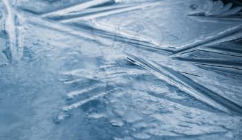 Blue ice texture, close up background photo