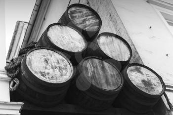 Old wooden barrels, close up black and white photo