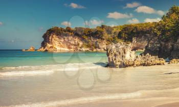 Coastal rocks of Macao Beach, vintage toned landscape of Dominican Republic, Hispaniola Island