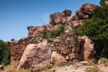 Stone ruins in mountains. Landscape of Piana region, South Corsica, France