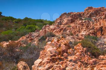 Corse-du-Sud wild nature. South region of Corsica island, France. Landscape of Piana district with red rocky mountains