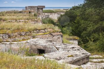 Old abandoned concrete bunkers system from WWII period on Totleben fort island in Gulf of Finland near Saint-Petersburg in Russia