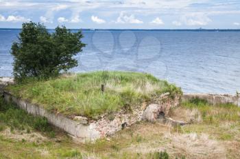 Old abandoned concrete bunker from WWII period on Totleben fort island in Gulf of Finland near Saint-Petersburg in Russia