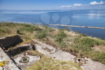 Old abandoned concrete bunkers from WWII period on Totleben fort island in Gulf of Finland near Saint-Petersburg in Russia